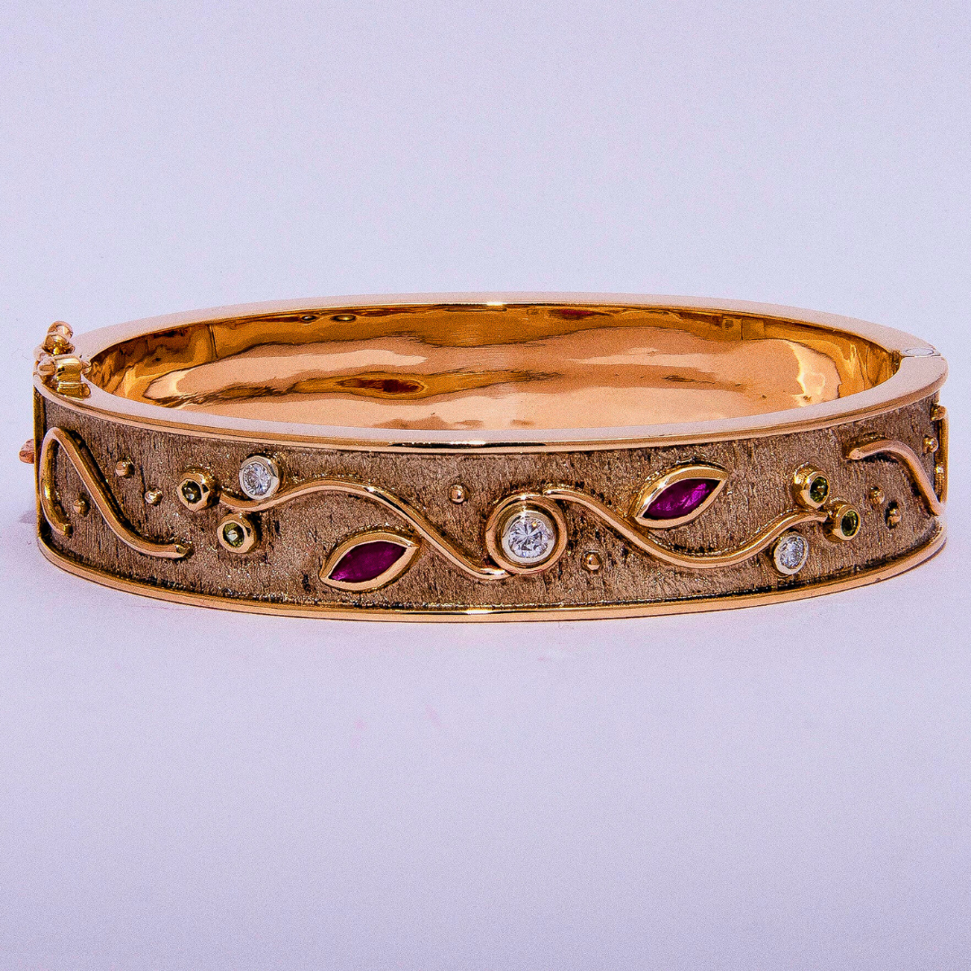 0.82ct Diamond, Ruby, & Peridot Unique Bangle in 9ct Yellow Gold