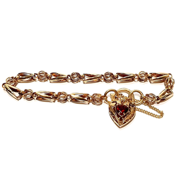 yellow gold tulip chain link bracelet with garnet heart padlock | LONDON LOANS