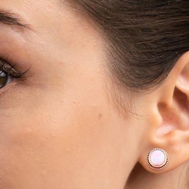 white opal stud earrings in yellow gold | LONDON LOANS